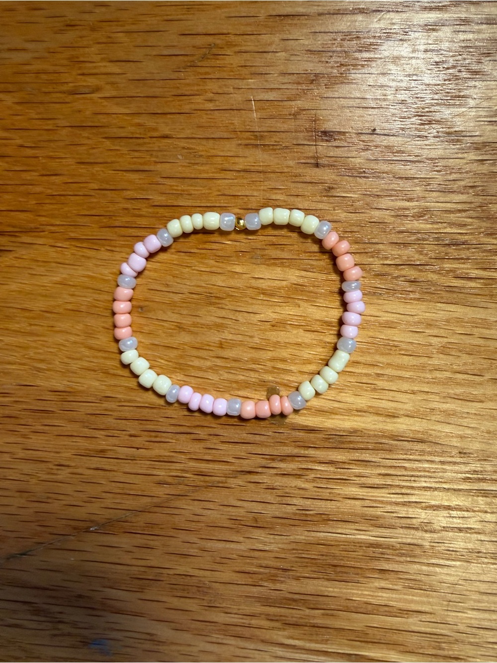 Handmade seed bead pastel pink yellow and orange bracelet